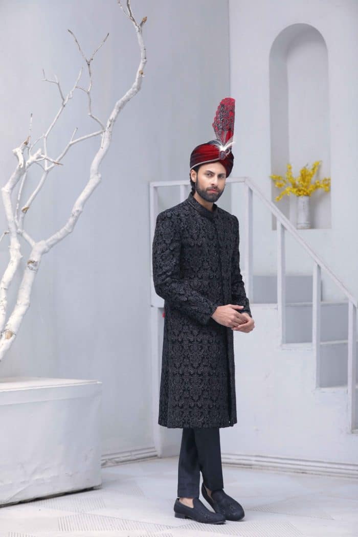 Classic black embroidered sherwani for groom with tailored fit Classic black embroidered sherwani for groom with tailored fit