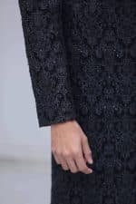 hand Close-up of embroidery on classic black sherwani collar