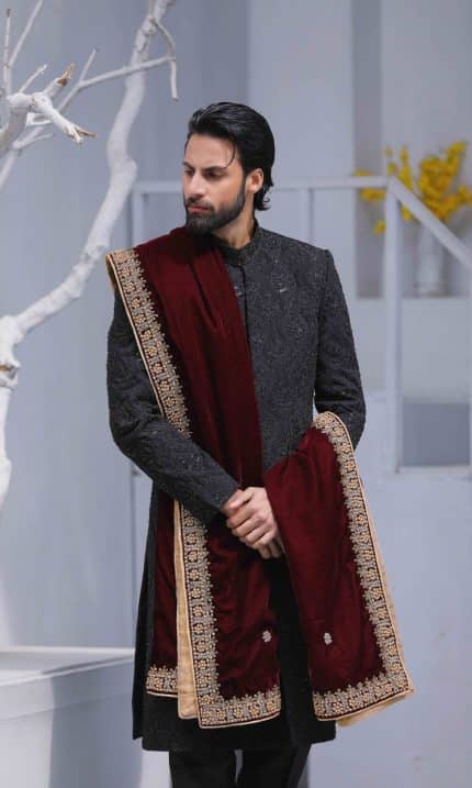 Black sherwani with royal embroidered shawl for groom