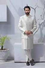 Off white prince coat for groom with subtle embroidery