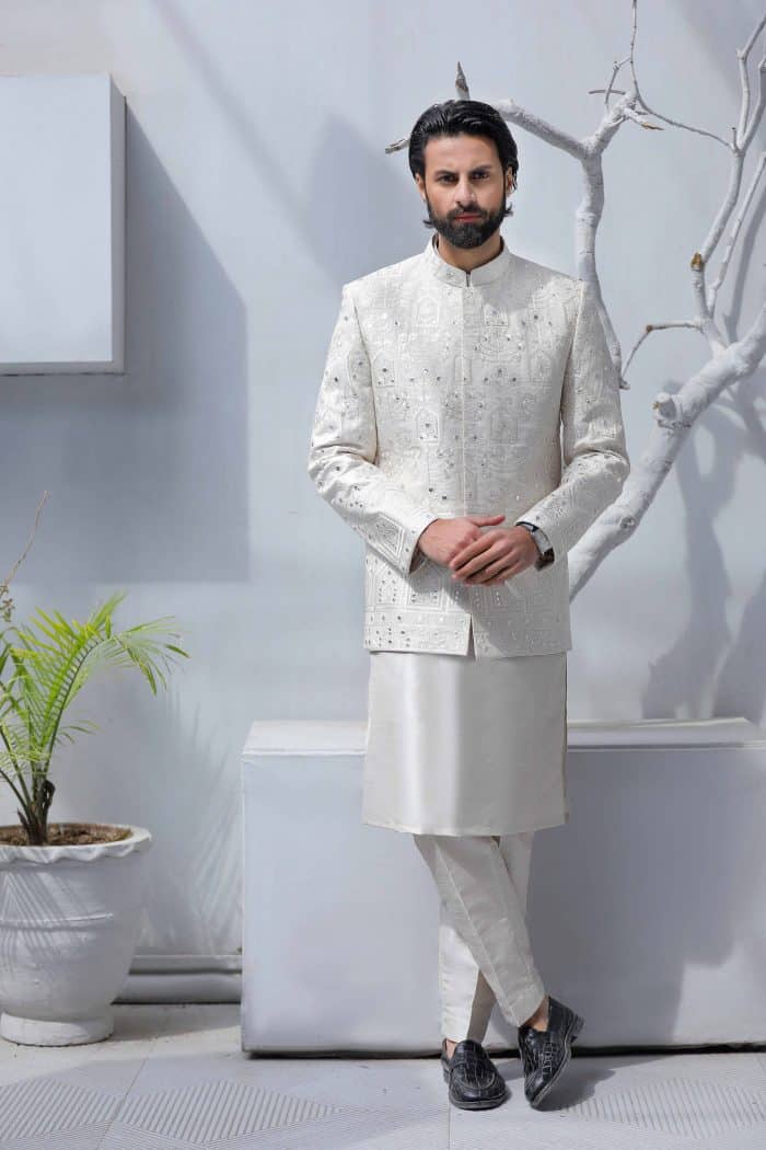 Off white prince coat for groom with subtle embroidery