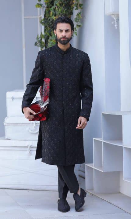 Classic black sherwani for groom with subtle detailing