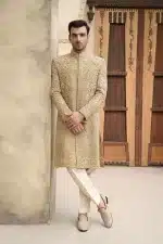 Golden jamawar sherwani for groom with heavy embroidery