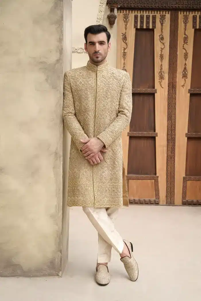 Golden jamawar sherwani for groom with heavy embroidery Golden jamawar sherwani for groom with heavy embroidery