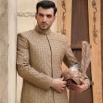 Beige groom sherwani with digital threadwork and hidden buttons