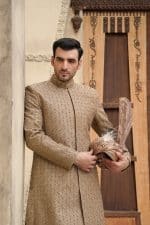 Beige groom sherwani with digital threadwork and hidden buttons