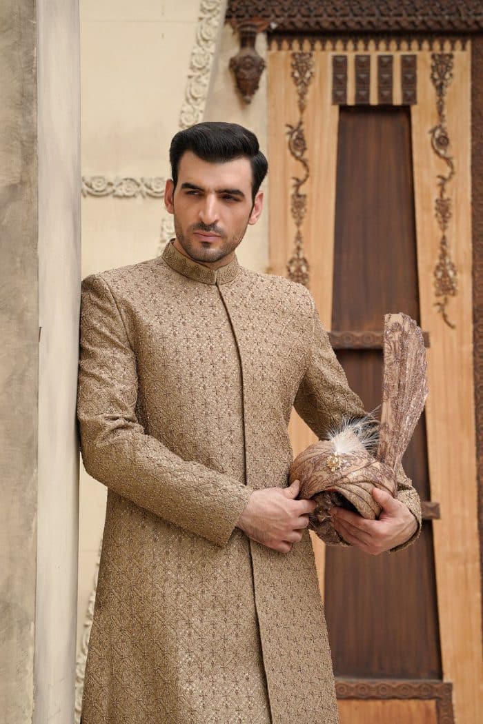 Beige groom sherwani with digital threadwork and hidden buttons Beige groom sherwani with digital threadwork and hidden buttons