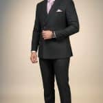 Man wearing 2 piece suit at formal event