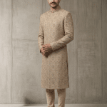Elevate your wedding and festive wardrobe with this exquisite beige silk sherwani, meticulously crafted with intricate handcrafted zardozi embroidery.