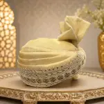 Elevate your wedding look with this elegant royal golden turban, crafted to add a touch of sophistication and grandeur.