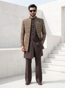 Make a lasting impression with our Luxury Brown Jacquard Short Sherwani Three Piece Suit. Featuring an intricately woven jacquard short sherwani