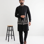 Elevate your traditional look with this premium Black Jamawar Waistcoat, expertly crafted from high-quality Jamawar fabric.