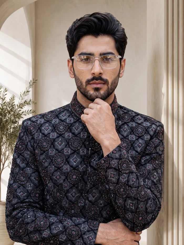 Black sherwani with digital thread handmade embroidery for men’s wedding and formal wear.